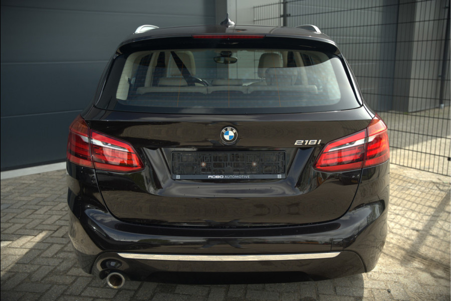 BMW 2 Serie Active Tourer 218i High Executive Luxury Line | Panoramadak | Stoelverwarming | Head-Up Display | Parkeersensoren | Navigatie | Trekhaak | Cruise Control | Climate Control | NAP