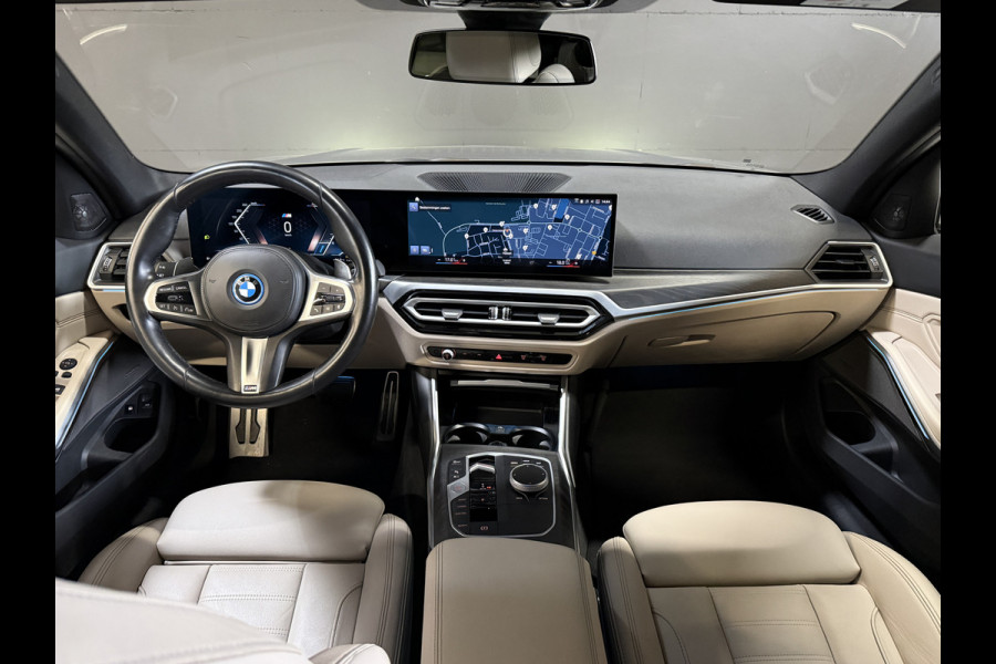 BMW 3 Serie Touring 330e | M-pakket | Lederen sportstoelen | Harman/Kardon | Sfeerverlichting | Full LED