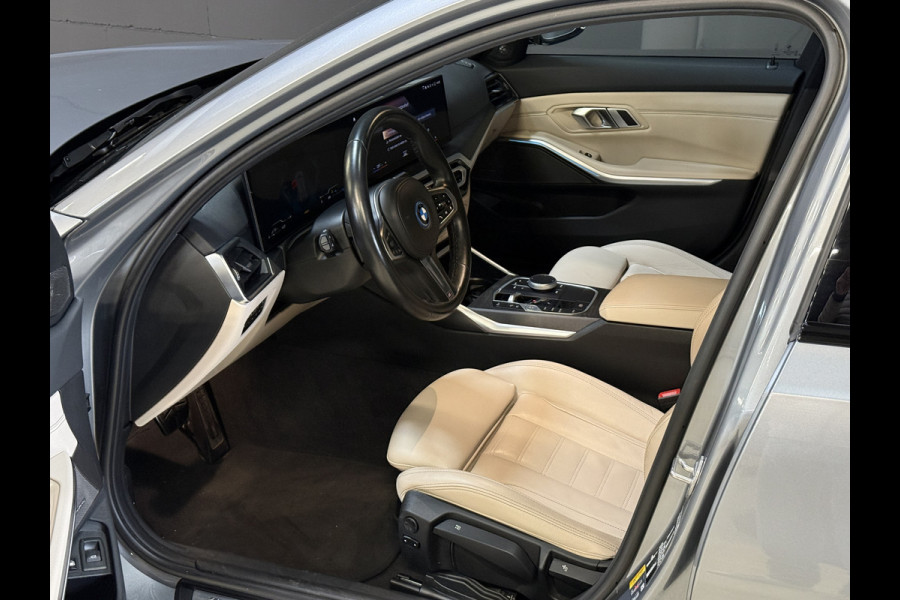 BMW 3 Serie Touring 330e | M-pakket | Lederen sportstoelen | Harman/Kardon | Sfeerverlichting | Full LED