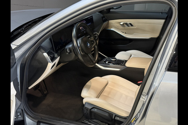 BMW 3 Serie Touring 330e | M-pakket | Lederen sportstoelen | Harman/Kardon | Sfeerverlichting | Full LED