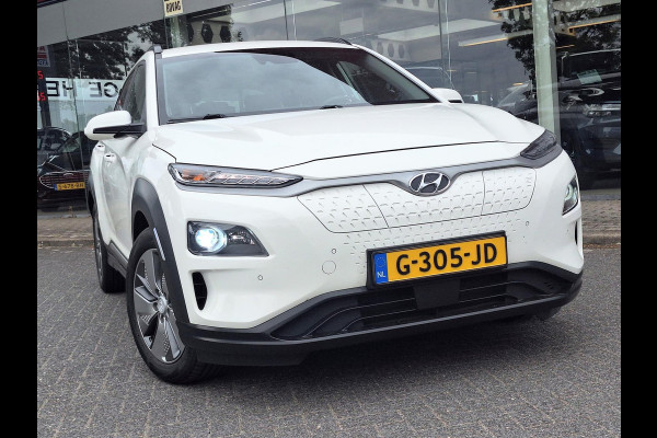 Hyundai Kona EV Premium 64 kWh | SOH: 96,8% | Warmtepomp | Lage km-stand | Leder | HUD | Blindspot | Full LED |