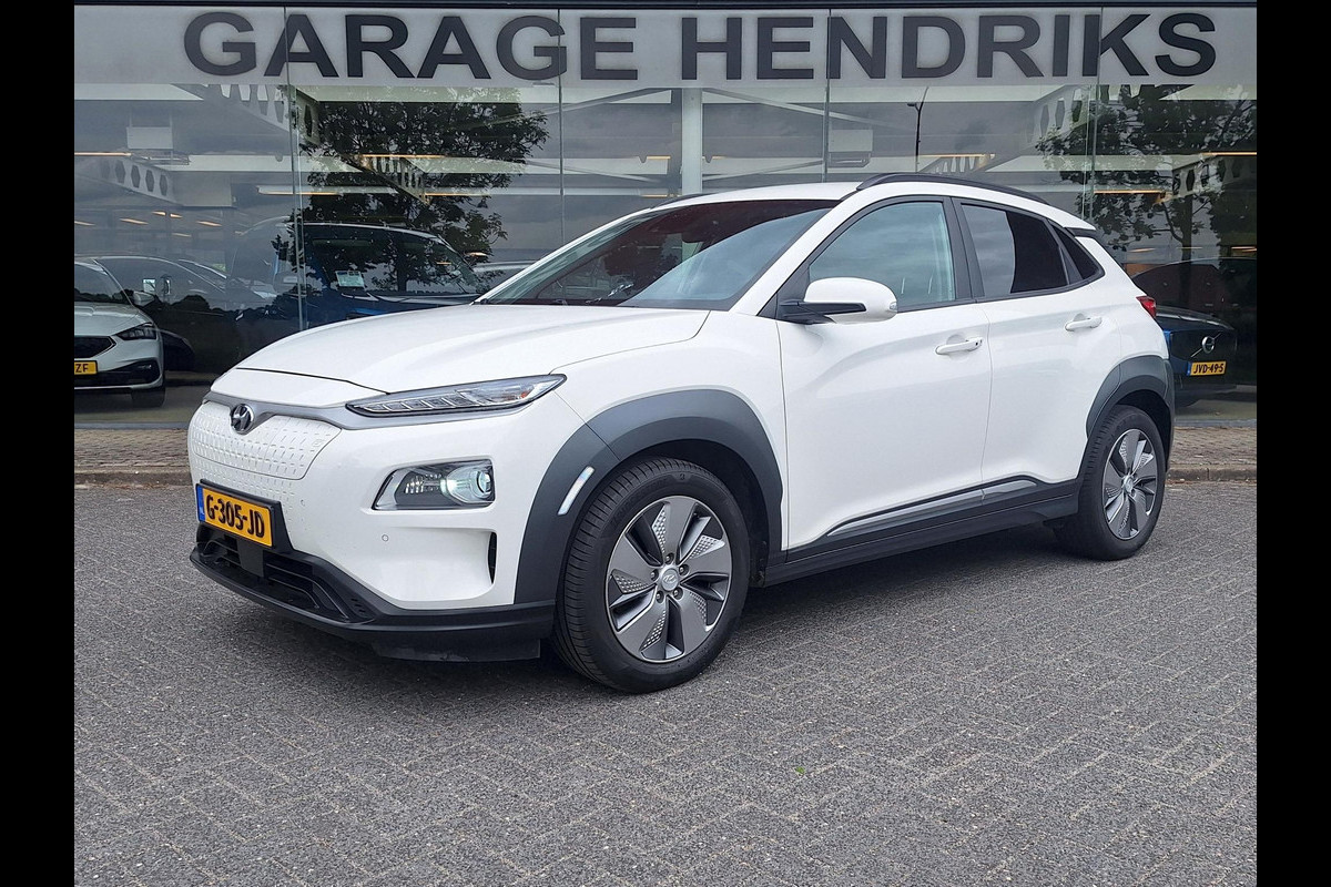 Hyundai Kona EV Premium 64 kWh | SOH: 96,8% | Warmtepomp | Lage km-stand | Leder | HUD | Blindspot | Full LED |