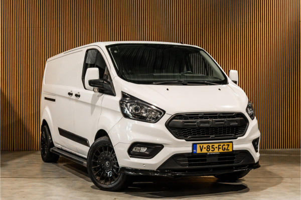 Ford Transit Custom 300 2.0 TDCI L2H1 | CarPlay | Camera | Cruise control | PDC V+A | Trekhaak | Raptor Edition | Nieuwe APK | Onderhoudsbeurt
