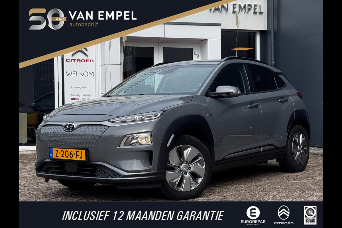Hyundai Kona EV Comfort Smart 39 kWh | 100% SOH | Trekhaak | Camera | Stoel + Stuurverwarming | Navigatie