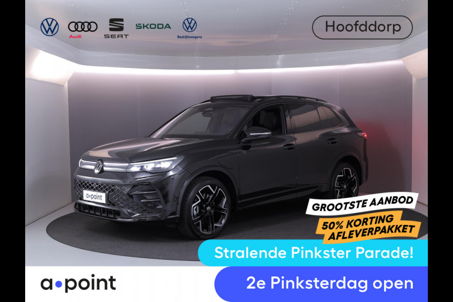 Volkswagen Tiguan 1.5 eHybrid R-Line Edition 272 pk Automaat (DSG) | Verlengde garantie | Navigatie | Panoramadak | Trekhaak (wegklapbaar) | Parkeersensoren (Park assist) | Rondomzicht camera| Lederen bekleding | Stoelverwarming v/a | R-Line |