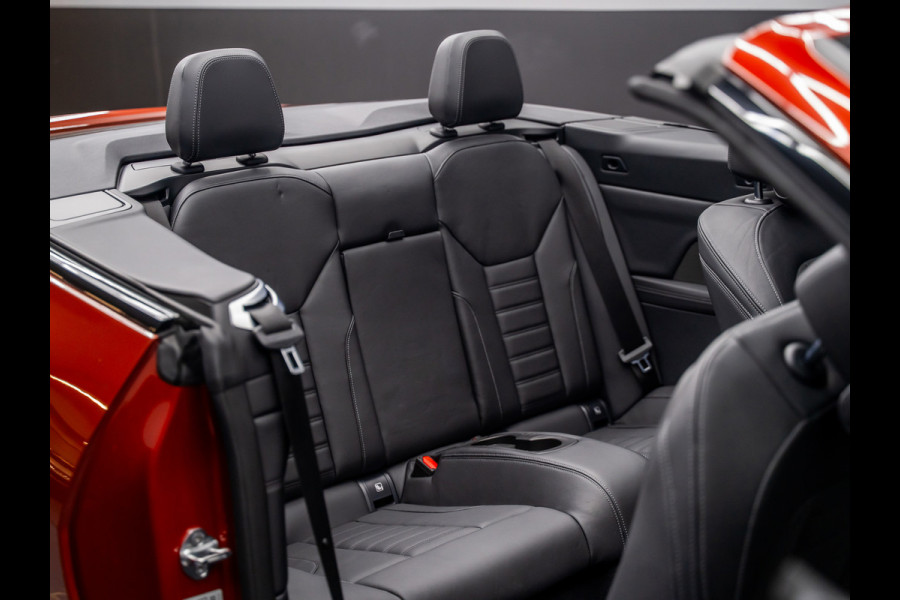 BMW 4 Serie Cabrio 420i High Executive | Sportleder | Camera | Harman | Laser | Head-up
