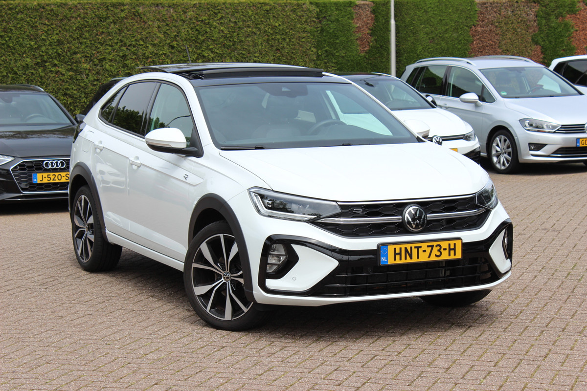 Volkswagen Taigo 1.5 TSI R-Line Business / Panoramadak / Camera / Keyless / Matrix LED / 18'' / Sfeerverlichting / CarPlay / Stoelverwarming / DAB / ACC
