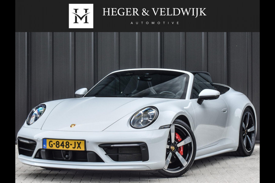 Porsche 911 Cabrio 3.0 Carrera 4 S NL-Auto 451pk | Sport design pack | Achteras besturing | Lift systeem | Sport chrono | 18-wegs memory seats | Burmester sound | Adaptive cruise | Carbon pack | Matrix led | 360 camera | Nw prijs 236.000
