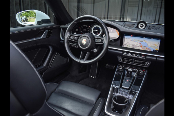 Porsche 911 Cabrio 3.0 Carrera 4 S NL-Auto 451pk | Sport design pack | Achteras besturing | Lift systeem | Sport chrono | 18-wegs memory seats | Burmester sound | Adaptive cruise | Carbon pack | Matrix led | 360 camera | Nw prijs 236.000
