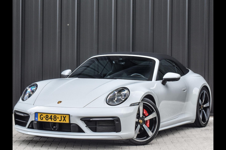 Porsche 911 Cabrio 3.0 Carrera 4 S NL-Auto 451pk | Sport design pack | Achteras besturing | Lift systeem | Sport chrono | 18-wegs memory seats | Burmester sound | Adaptive cruise | Carbon pack | Matrix led | 360 camera | Nw prijs 236.000