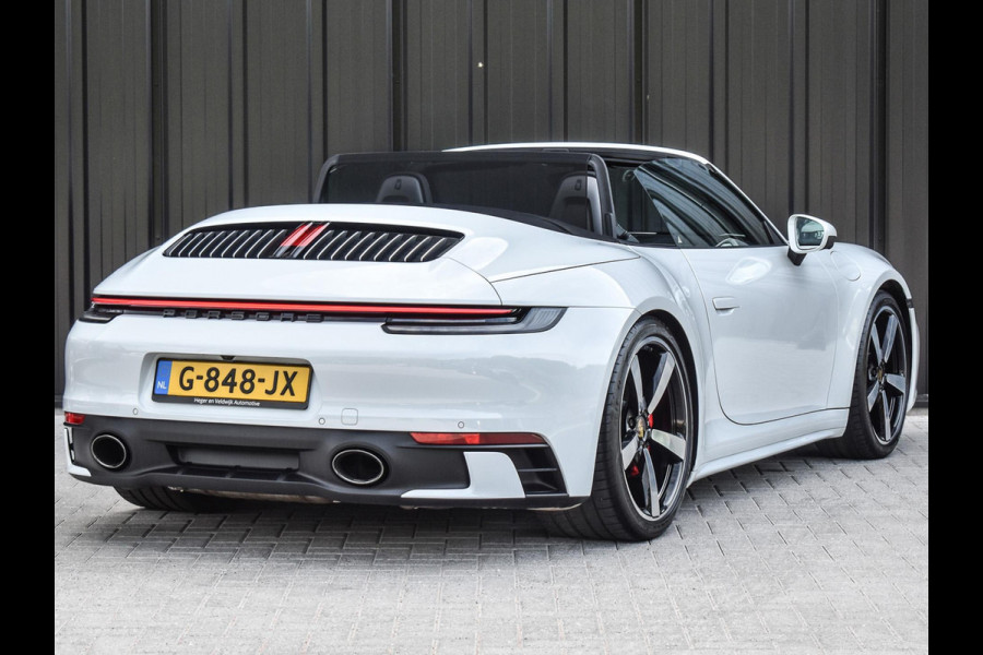 Porsche 911 Cabrio 3.0 Carrera 4 S NL-Auto 451pk | Sport design pack | Achteras besturing | Lift systeem | Sport chrono | 18-wegs memory seats | Burmester sound | Adaptive cruise | Carbon pack | Matrix led | 360 camera | Nw prijs 236.000