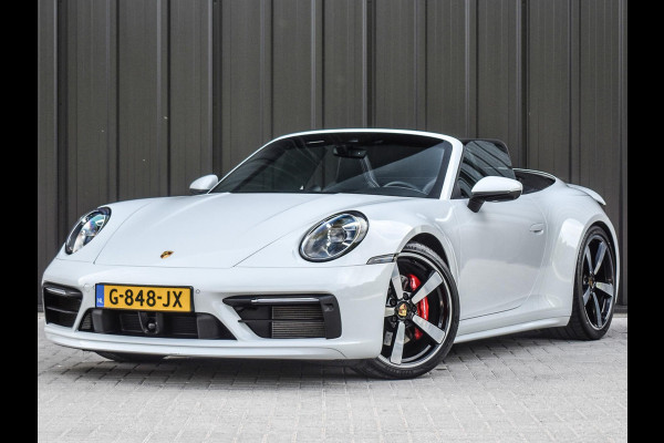 Porsche 911 Cabrio 3.0 Carrera 4 S NL-Auto 451pk | Sport design pack | Achteras besturing | Lift systeem | Sport chrono | 18-wegs memory seats | Burmester sound | Adaptive cruise | Carbon pack | Matrix led | 360 camera | Nw prijs 236.000