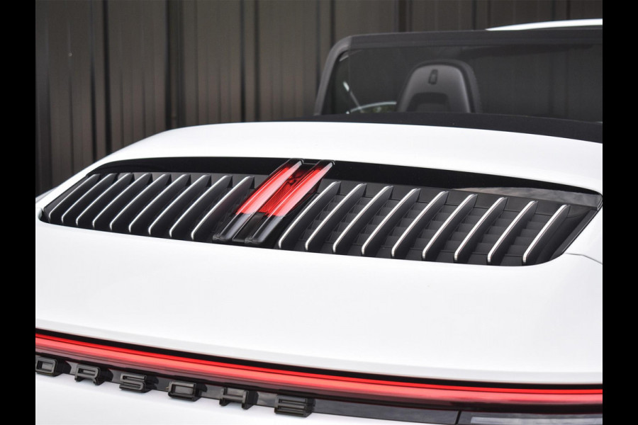 Porsche 911 Cabrio 3.0 Carrera 4 S NL-Auto 451pk | Sport design pack | Achteras besturing | Lift systeem | Sport chrono | 18-wegs memory seats | Burmester sound | Adaptive cruise | Carbon pack | Matrix led | 360 camera | Nw prijs 236.000