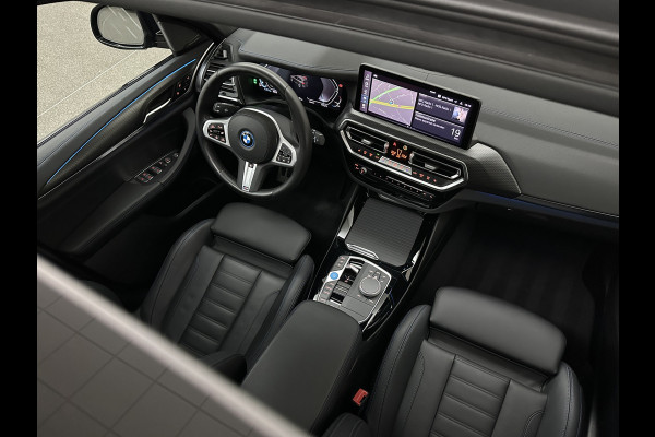 BMW iX3 M-Sport 80 kWh | 99% SOH | Panorama | ACC | 360 Camera | Harman-Kardon | Leder | Memory | Sfeerverlichting | Keyless-Entry | Head-Up | 3-Zone Clima | Stuurverwarming | Carplay | LED | Rijklaar incl. Bovag garantie