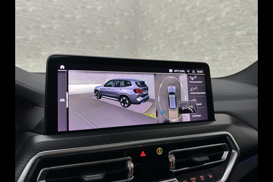 BMW iX3 M-Sport 80 kWh | 99% SOH | Panorama | ACC | 360 Camera | Harman-Kardon | Leder | Memory | Sfeerverlichting | Keyless-Entry | Head-Up | 3-Zone Clima | Stuurverwarming | Carplay | LED | Rijklaar incl. Bovag garantie