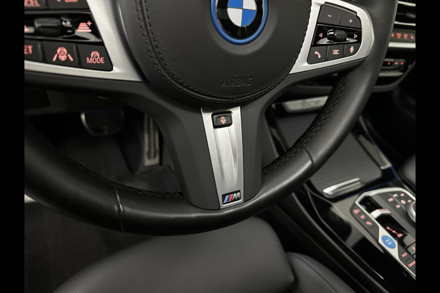 BMW iX3 M-Sport 80 kWh | 99% SOH | Panorama | ACC | 360 Camera | Harman-Kardon | Leder | Memory | Sfeerverlichting | Keyless-Entry | Head-Up | 3-Zone Clima | Stuurverwarming | Carplay | LED | Rijklaar incl. Bovag garantie