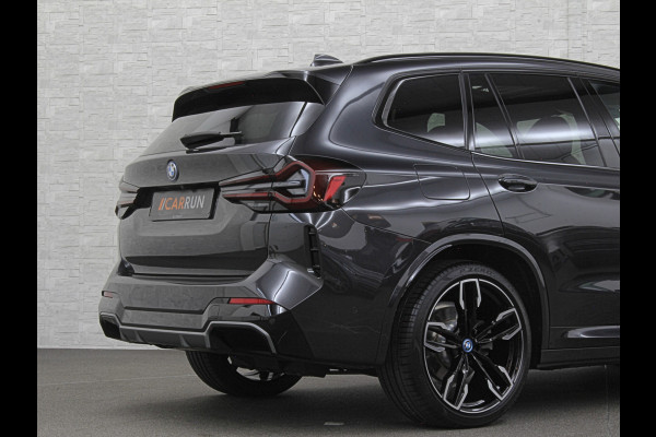 BMW iX3 M-Sport 80 kWh | 99% SOH | Panorama | ACC | 360 Camera | Harman-Kardon | Leder | Memory | Sfeerverlichting | Keyless-Entry | Head-Up | 3-Zone Clima | Stuurverwarming | Carplay | LED | Rijklaar incl. Bovag garantie