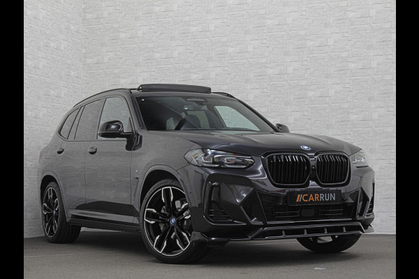 BMW iX3 M-Sport 80 kWh | 99% SOH | Panorama | ACC | 360 Camera | Harman-Kardon | Leder | Memory | Sfeerverlichting | Keyless-Entry | Head-Up | 3-Zone Clima | Stuurverwarming | Carplay | LED | Rijklaar incl. Bovag garantie