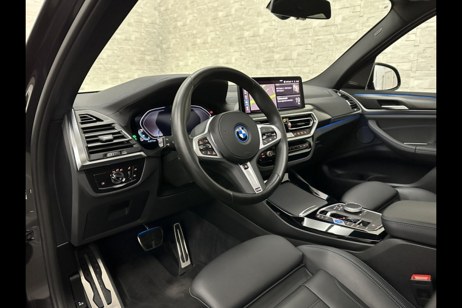 BMW iX3 M-Sport 80 kWh | 99% SOH | Panorama | ACC | 360 Camera | Harman-Kardon | Leder | Memory | Sfeerverlichting | Keyless-Entry | Head-Up | 3-Zone Clima | Stuurverwarming | Carplay | LED | Rijklaar incl. Bovag garantie