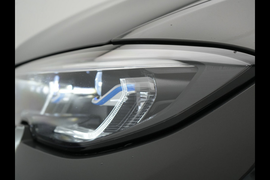 BMW 3 Serie Touring 330e M Sport PHEV 293pk Dealer O.H. Dravitgrau | Head Up | Camera | Laser LED | Sfeerverlichting | Lederen Sportstoelen & Stuur Verwarmd | Apple Carplay | Keyless | Blis | 19"L.M | Virtual | Navigatie | DAB | Plug In Hybrid |