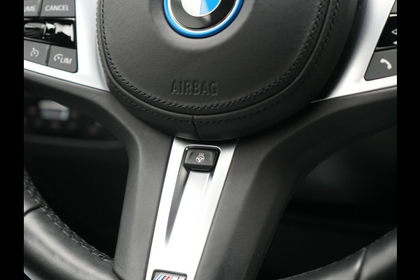 BMW 3 Serie Touring 330e M Sport PHEV 293pk Dealer O.H. Dravitgrau | Head Up | Camera | Laser LED | Sfeerverlichting | Lederen Sportstoelen & Stuur Verwarmd | Apple Carplay | Keyless | Blis | 19"L.M | Virtual | Navigatie | DAB | Plug In Hybrid |