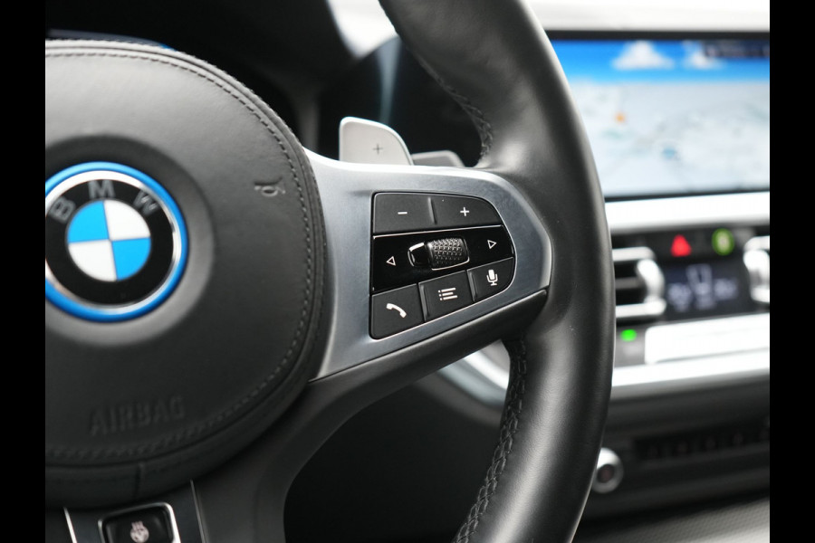 BMW 3 Serie Touring 330e M Sport PHEV 293pk Dealer O.H. Dravitgrau | Head Up | Camera | Laser LED | Sfeerverlichting | Lederen Sportstoelen & Stuur Verwarmd | Apple Carplay | Keyless | Blis | 19"L.M | Virtual | Navigatie | DAB | Plug In Hybrid |