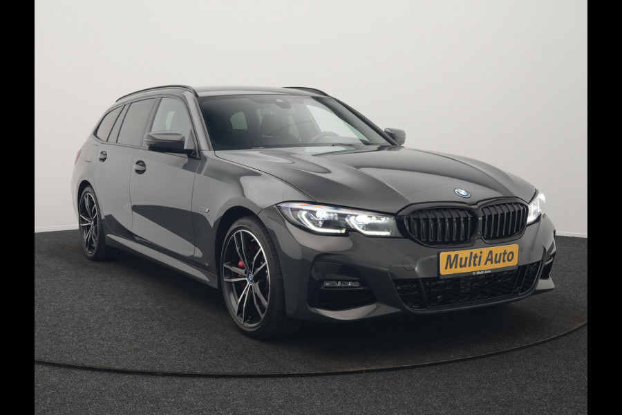 BMW 3 Serie Touring 330e M Sport PHEV 293pk Dealer O.H. Dravitgrau | Head Up | Camera | Laser LED | Sfeerverlichting | Lederen Sportstoelen & Stuur Verwarmd | Apple Carplay | Keyless | Blis | 19"L.M | Virtual | Navigatie | DAB | Plug In Hybrid |