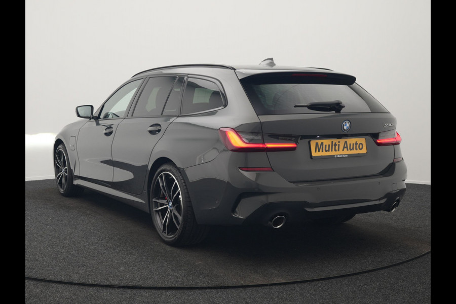 BMW 3 Serie Touring 330e M Sport PHEV 293pk Dealer O.H. Dravitgrau | Head Up | Camera | Laser LED | Sfeerverlichting | Lederen Sportstoelen & Stuur Verwarmd | Apple Carplay | Keyless | Blis | 19"L.M | Virtual | Navigatie | DAB | Plug In Hybrid |