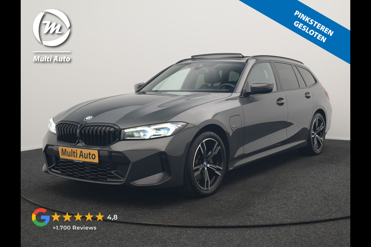 BMW 3 Serie Touring 330e M Sport FACELIFT PHEV 293pk Dealer O.H. | Dravitgray | Trekhaak Af Fabriek | Panodak | Head Up | Camera | Lederen Sportstoelen Verwarmd | Sfeerverlichting | Apple Carplay | Keyless | Blis | Cruise Control | Navigatie | DAB | Plug In Hybrid |