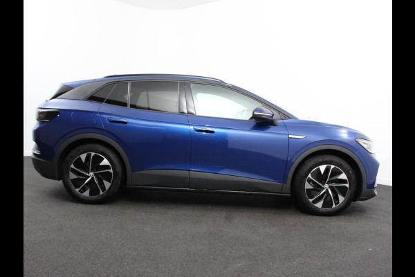 Volkswagen ID.4 Business 77 kWh SOH 83% Leder Navigatie 19" Lichtmetalen Velgen Apple Carplay/Android Auto Climate Control Warmtepomp Stoelverwarming Led Parkeer sensoren