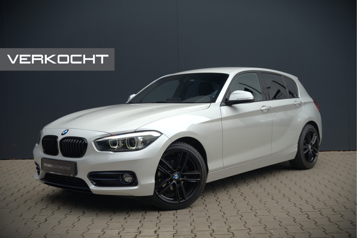BMW 1-serie 118i Sport Line Edition | Stoelverwarming | Cruise Control | Parkeersensoren | Navigatie | Groot Scherm | Digitale Tellers | Automaat | Keyless | Trekhaak | LED