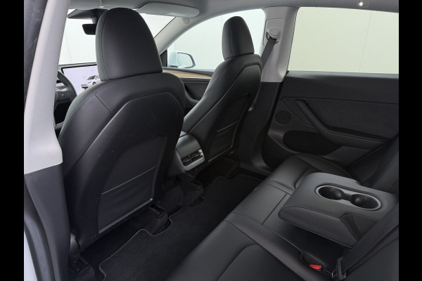 Tesla Model Y RWD 300PK LFP Accu SOH 92,5% Trekhaak Warmtepomp Leder Navi Ecc Adap.Cruise Panoramadak Camera's Stuur+Stoelverwarming Led Traffic-Aware Cruise Control Toybox Elek.Achterklep 1.600KG Trekgewicht 1e Eigenaar Origineel Nederlandse Auto