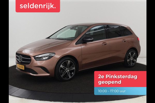 Mercedes-Benz B-Klasse 250e Urban Night | SOH 92% | Adaptive cruise | Stoelverwarming | Camera | Carplay | Sfeerverlichting | Half leder | Full LED | Widescreen | Park Assist | Navigatie | PHEV | Plug In