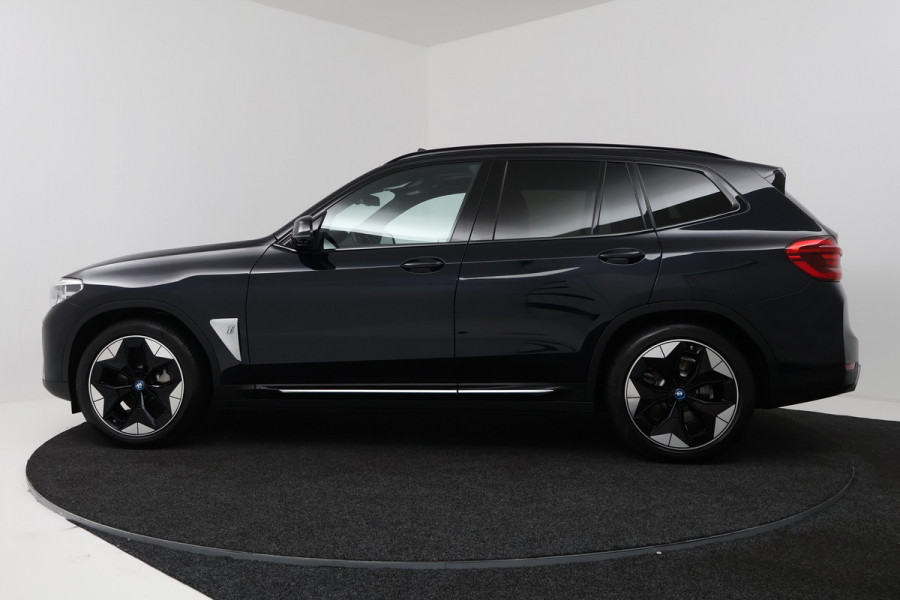 BMW iX3 High Executive 80 kWh (PANORAMADAK, 360 CAMERA, SFEERVERLICHTING, ADAPTIVE CRUISE, TREKHAAK WEGKLAPBAAR, AUTOPILOT)