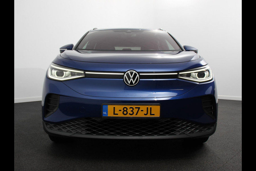 Volkswagen ID.4 Business 77 kWh SOH 83% Leder Navigatie 19" Lichtmetalen Velgen Apple Carplay/Android Auto Climate Control Warmtepomp Stoelverwarming Led Parkeer sensoren