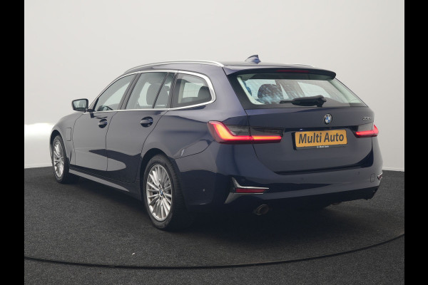 BMW 3 Serie Touring 330e Luxury Line PHEV 293pk Dealer O.H. | Trekhaak Af Fabriek | Panodak | Head Up | Adaptive Cruise | Laser LED | Camera | Lederen Comfortstoelen Verwarmd | Sfeerverlichting | Keyless | Blis | Apple Carplay | Navigatie | DAB | Plug In Hybrid |