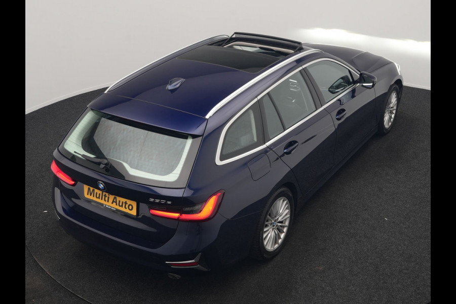BMW 3 Serie Touring 330e Luxury Line PHEV 293pk Dealer O.H. | Trekhaak Af Fabriek | Panodak | Head Up | Adaptive Cruise | Laser LED | Camera | Lederen Comfortstoelen Verwarmd | Sfeerverlichting | Keyless | Blis | Apple Carplay | Navigatie | DAB | Plug In Hybrid |