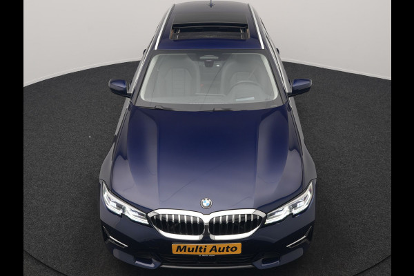 BMW 3 Serie Touring 330e Luxury Line PHEV 293pk Dealer O.H. | Trekhaak Af Fabriek | Panodak | Head Up | Adaptive Cruise | Laser LED | Camera | Lederen Comfortstoelen Verwarmd | Sfeerverlichting | Keyless | Blis | Apple Carplay | Navigatie | DAB | Plug In Hybrid |