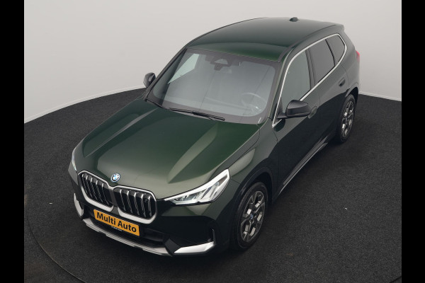 BMW iX1 xDrive30 xLine 67 kWh 306pk Dealer O.H. | Trekhaak Af Fabriek | Camera | Adaptief Onderstel | Lederen Sportstoelen Memory & Verwarmd | Sfeerverlichting | Apple Carplay | Blis | Navigatie | DAB | Virtual | Cruise Control |