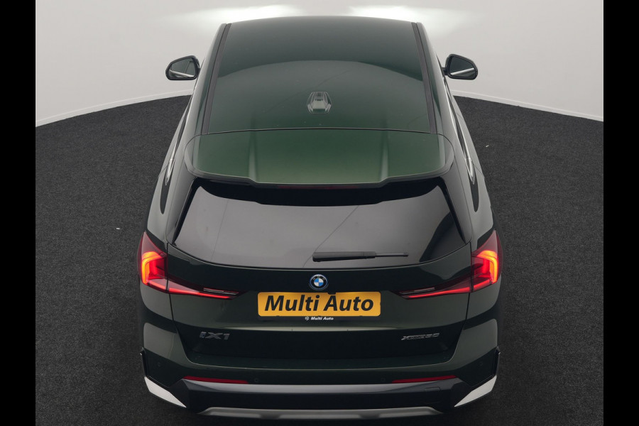 BMW iX1 xDrive30 xLine 67 kWh 306pk Dealer O.H. | Trekhaak Af Fabriek | Camera | Adaptief Onderstel | Lederen Sportstoelen Memory & Verwarmd | Sfeerverlichting | Apple Carplay | Blis | Navigatie | DAB | Virtual | Cruise Control |