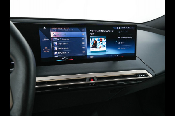BMW iX xDrive40 High Executive 77 kWh [ 3-Fase ] (INCL-BTW) *PANO | HEAD-UP | SOFT-CLOSE | LEATHER | TOPVIEW | FULL-LED | MEMORY-PACK | HARMAN/KARDON | BLINDSPOT | WIDESCREEN-COCKPIT | HEATED-COMFORTSEATS | DAB | AMBIENTLIGHT | TOWBAR | 22'