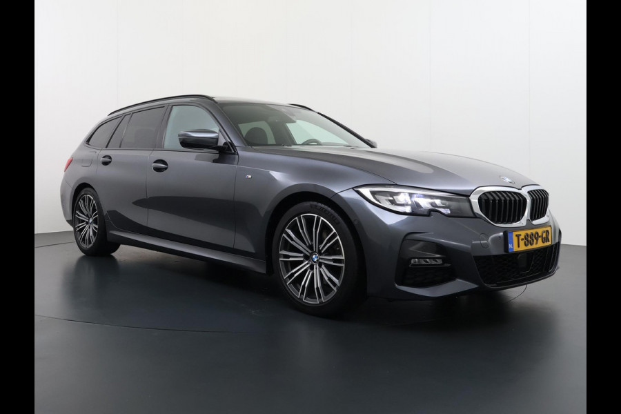 BMW 3 Serie Touring 320i Executive M Sport PANORAMADAK | ADAPTIVE CRUISE | BMW DEALER ONDERHOUDEN | GROOT ONDERHOUD GEHAD | RIJKLAAR | ELEKTRISCHE ACHTERKLEP | CAMERA | STOELVERWARMING | 12 MND BOVAG GARANTIE | APPLE CARPLAY