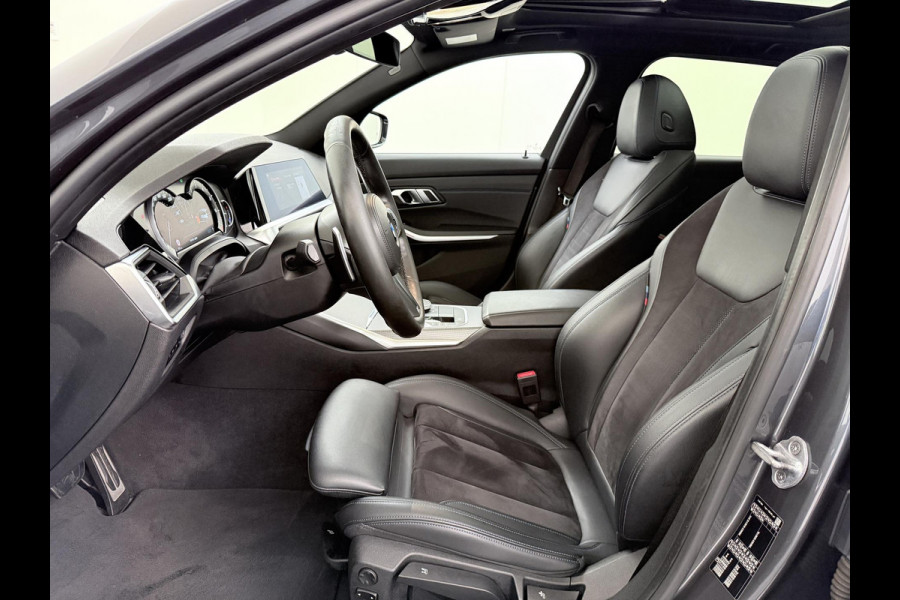 BMW 3 Serie Touring 320i Executive M Sport PANORAMADAK | ADAPTIVE CRUISE | BMW DEALER ONDERHOUDEN | GROOT ONDERHOUD GEHAD | RIJKLAAR | ELEKTRISCHE ACHTERKLEP | CAMERA | STOELVERWARMING | 12 MND BOVAG GARANTIE | APPLE CARPLAY