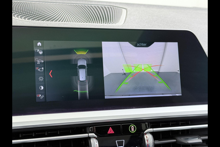 BMW 3 Serie Touring 320i Executive M Sport PANORAMADAK | ADAPTIVE CRUISE | BMW DEALER ONDERHOUDEN | GROOT ONDERHOUD GEHAD | RIJKLAAR | ELEKTRISCHE ACHTERKLEP | CAMERA | STOELVERWARMING | 12 MND BOVAG GARANTIE | APPLE CARPLAY