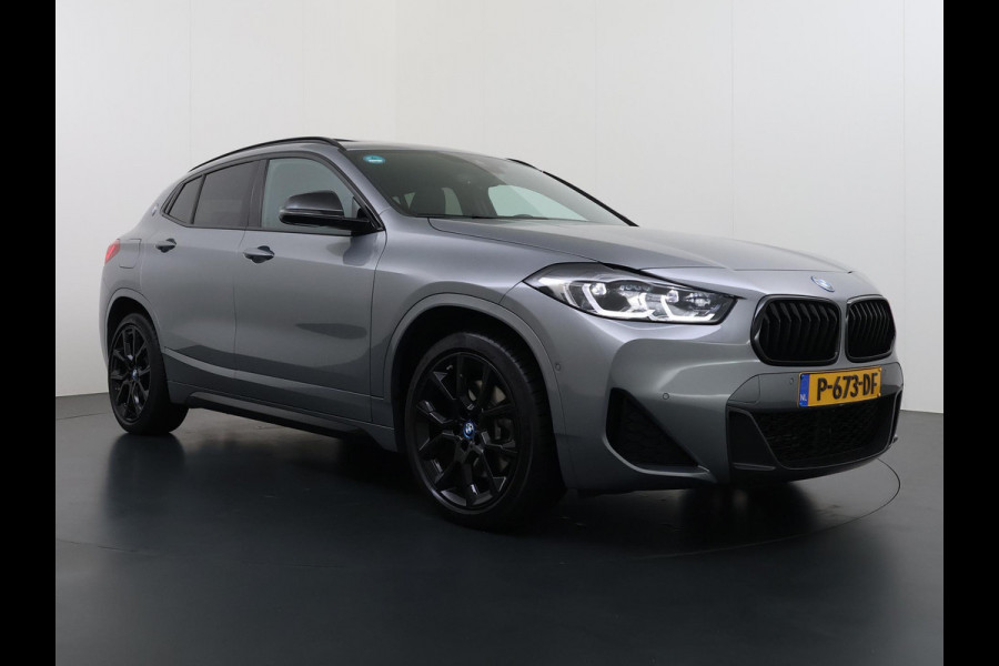 BMW X2 xDrive25e M SPORT Business Edition Plus VAN: 31.900,- VOOR: 29.330,- UW WKVOORDEEL: 2.570,- | BOMVOL | PHEV| PANO| NAP| STOEL + STUURVERWARMING| COMFORT ACCESS| ELEK. ACHTERKLEP| AFNEEMBARE TREKHAAK| HUD| ACHTERUITRIJCAMERA| APPLE CARPLAY