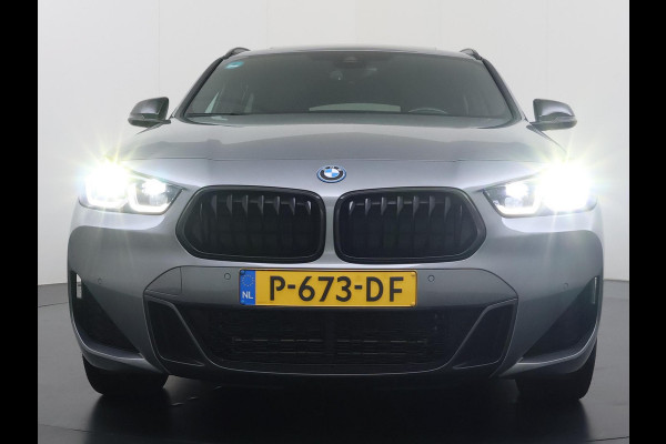 BMW X2 xDrive25e M SPORT Business Edition Plus VAN: 31.900,- VOOR: 29.330,- UW WKVOORDEEL: 2.570,- | BOMVOL | PHEV| PANO| NAP| STOEL + STUURVERWARMING| COMFORT ACCESS| ELEK. ACHTERKLEP| AFNEEMBARE TREKHAAK| HUD| ACHTERUITRIJCAMERA| APPLE CARPLAY