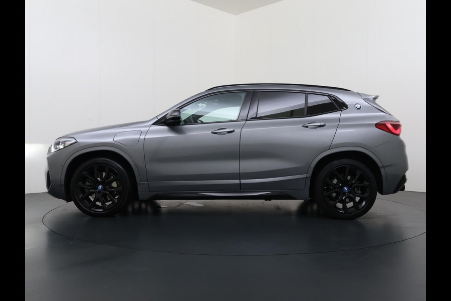 BMW X2 xDrive25e M SPORT Business Edition Plus VAN: 31.900,- VOOR: 29.330,- UW WKVOORDEEL: 2.570,- | BOMVOL | PHEV| PANO| NAP| STOEL + STUURVERWARMING| COMFORT ACCESS| ELEK. ACHTERKLEP| AFNEEMBARE TREKHAAK| HUD| ACHTERUITRIJCAMERA| APPLE CARPLAY
