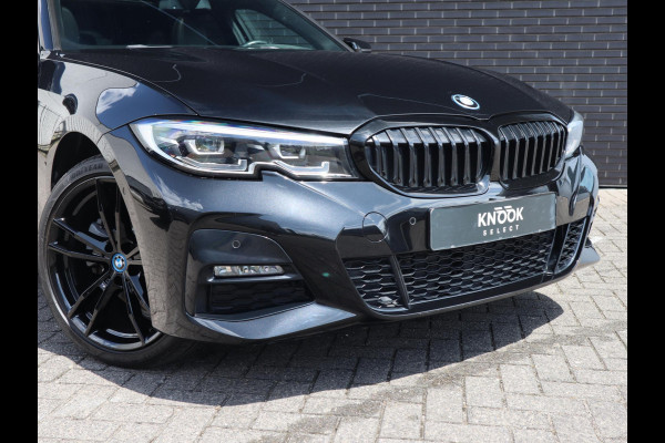 BMW 3 Serie Touring 320e xDrive High Executive M Sport Pakket Automaat / Live Cockpit Professional / Adaptief M Onderstel / Panoramadak / Stoelverwarming / Extra Getint Glas / LED / 19 Inch / Hifi / Lichtpakket