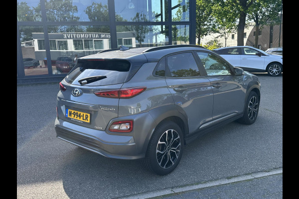 Hyundai Kona EV Premium 64 kWh SOH 97% | 12 MND BOVAG GARANTIE | STOEL/STUURVERWARMING | ELEK. STOELEN | DODEHOEK | KEYLESS | ACHTERUITRIJ CAMERA | HEAD UP | ADAP. CRUISE |