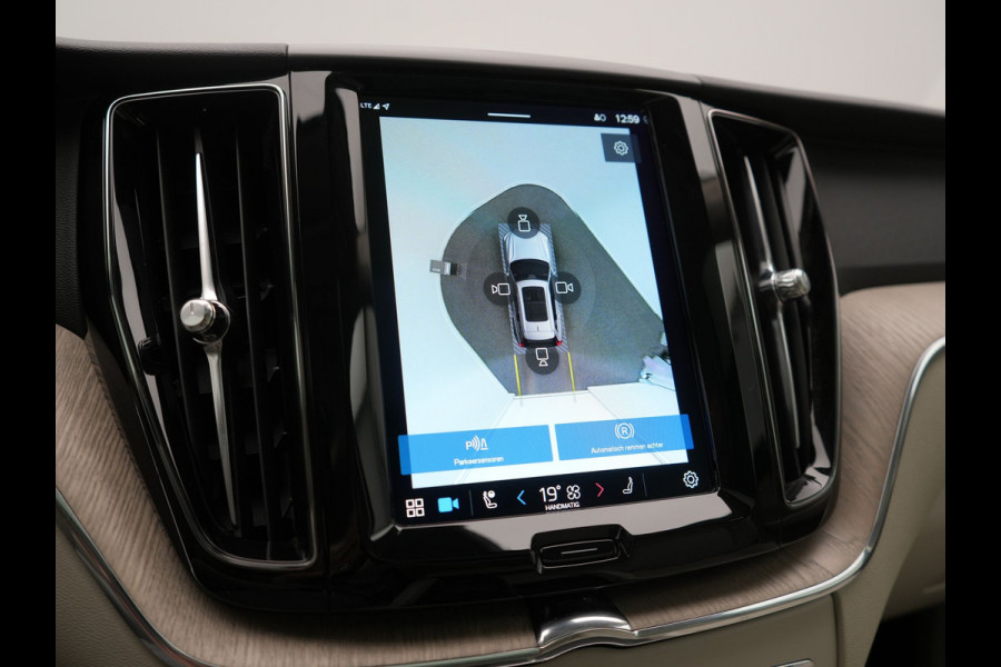 Volvo XC60 T6 AWD R-Design LONG RANGE PHEV 350pk Dealer O.H. | Trekhaak Af Fabriek | Panodak | Adaptive Cruise | 360 Camera | Harman / Kardon | Lederen Sportstoelen Memory & Verwarmd | Blis | Keyless | Google Assistent | Apple Carplay | DAB | Plug In Hybrid |